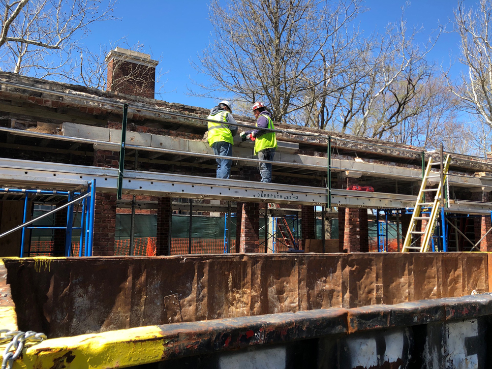 Removing east side lintel block