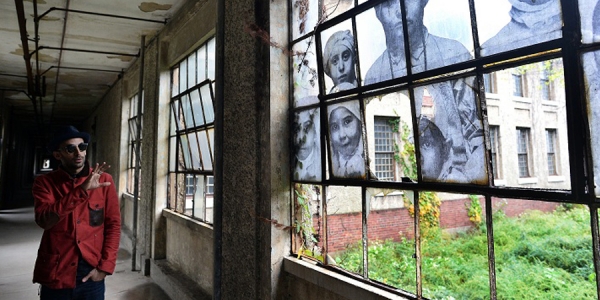 Join us for a Special Tour of JR’s Exhibit Unframed-Ellis Island